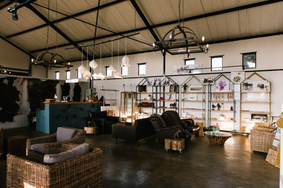 Interior of a large café and gift shop with chandeliers