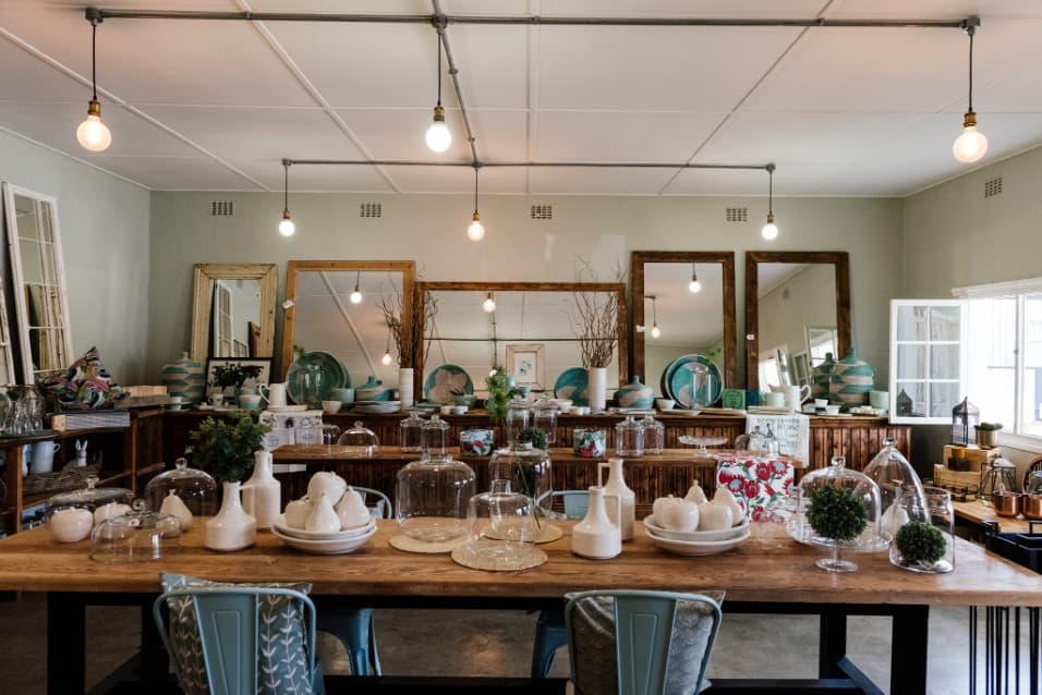 Interior of The Ruby Orchard shop with long display tables