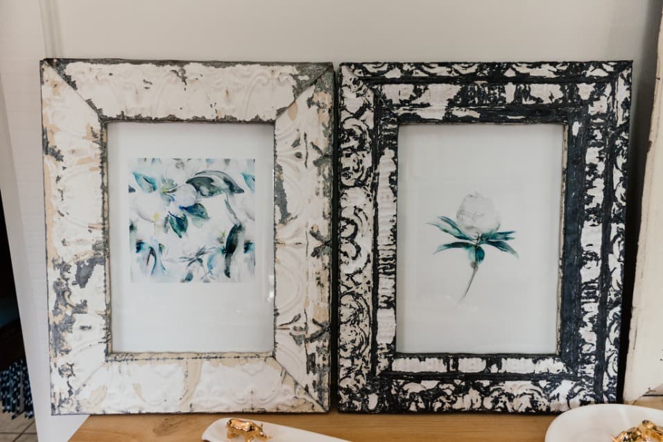 Two framed prints by Lara Waldburger
