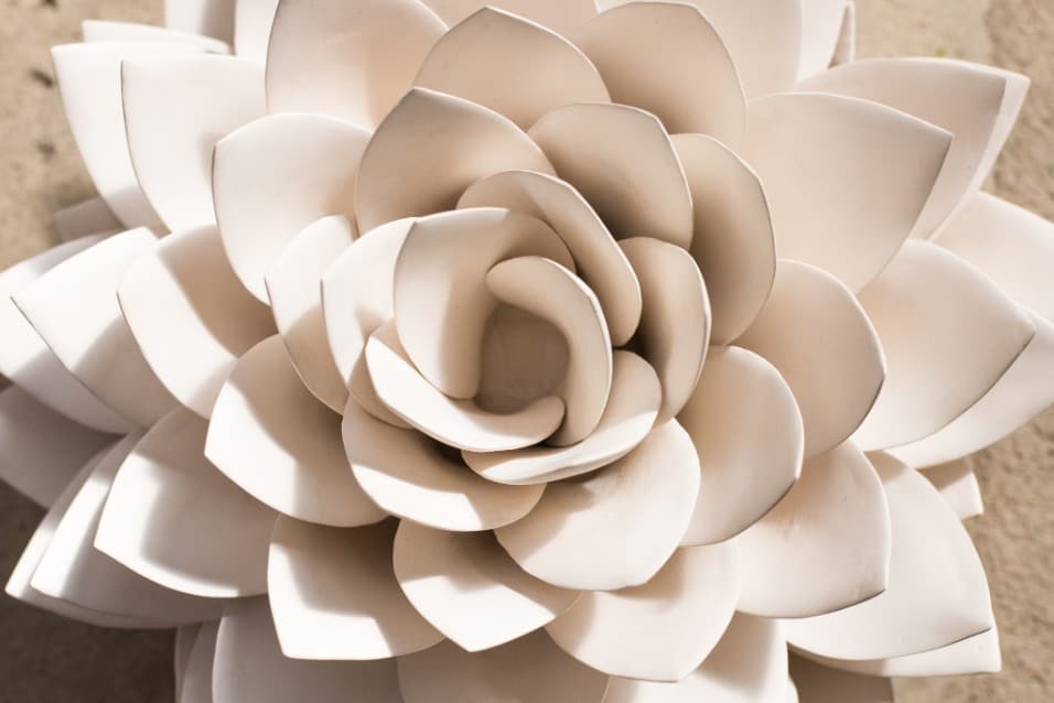 White ceramic flower sculpture, close up