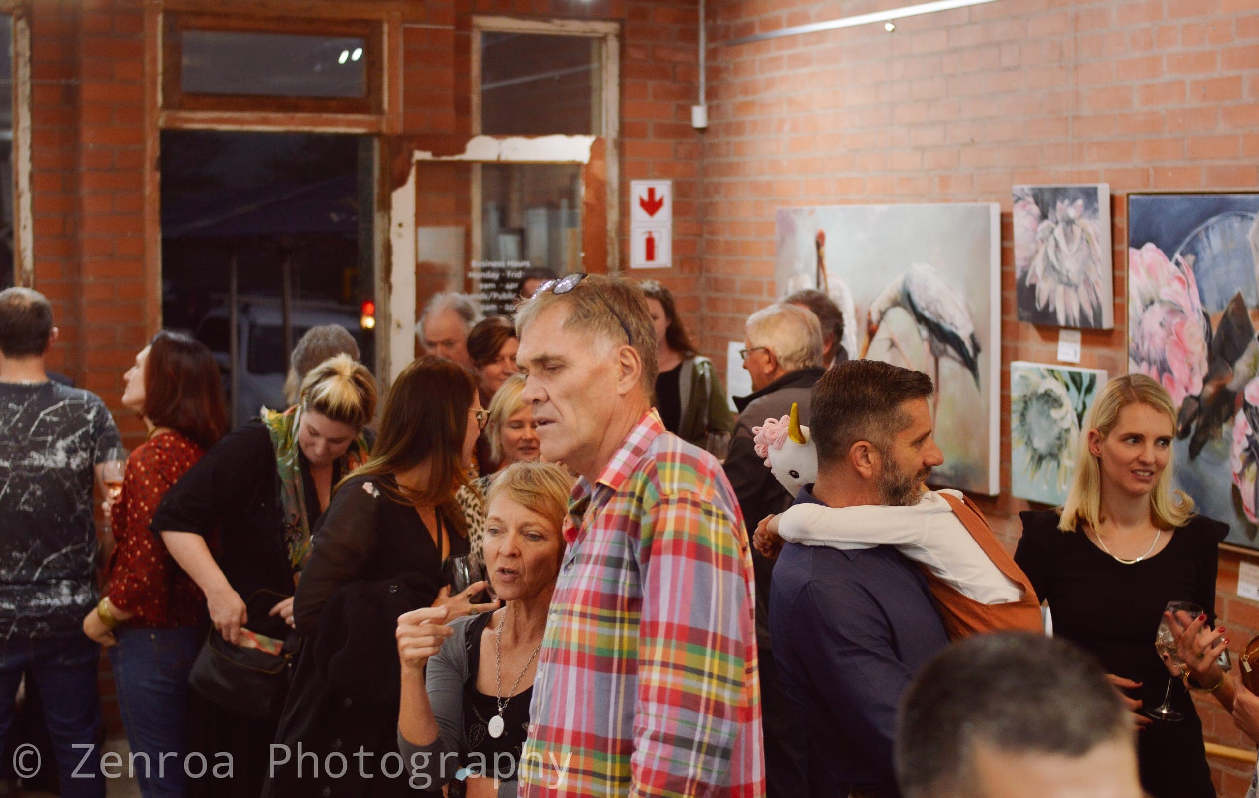 Crowd of guests at the exhibition opening