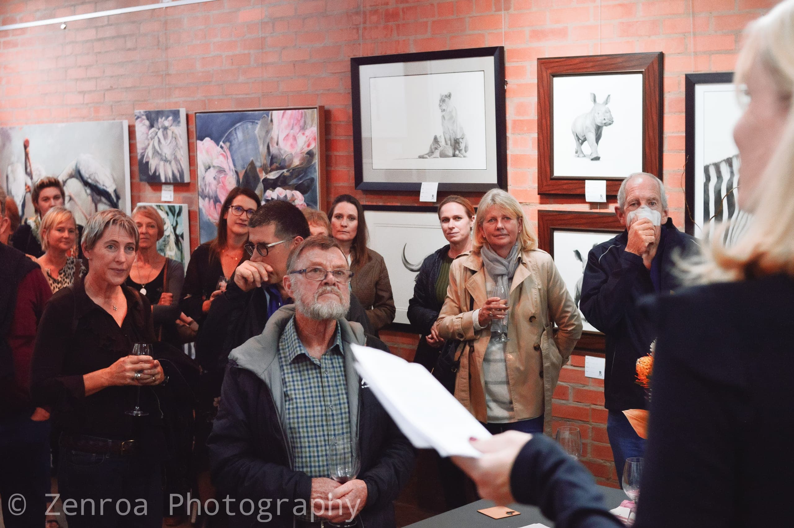 Guests gathered in the gallery during the opening speech